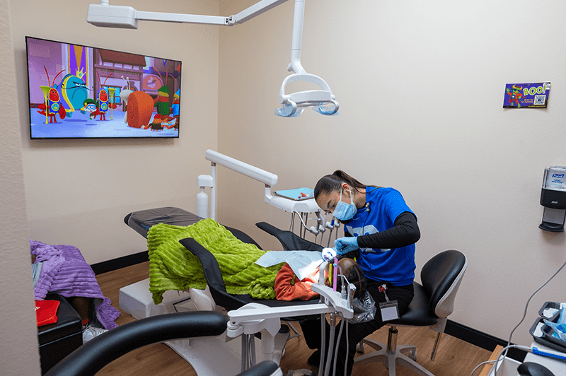 Kid smiling at Rodeo Dental