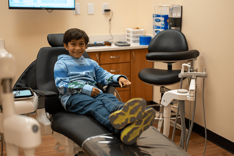 Child enjoying dental visit