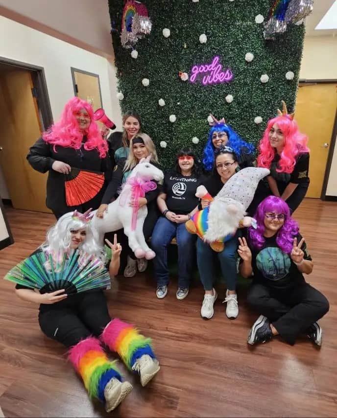 Rodeo Dental team with colorful wigs and good vibes