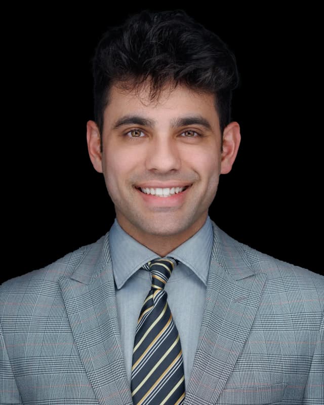 Dr. Kasra Roostan