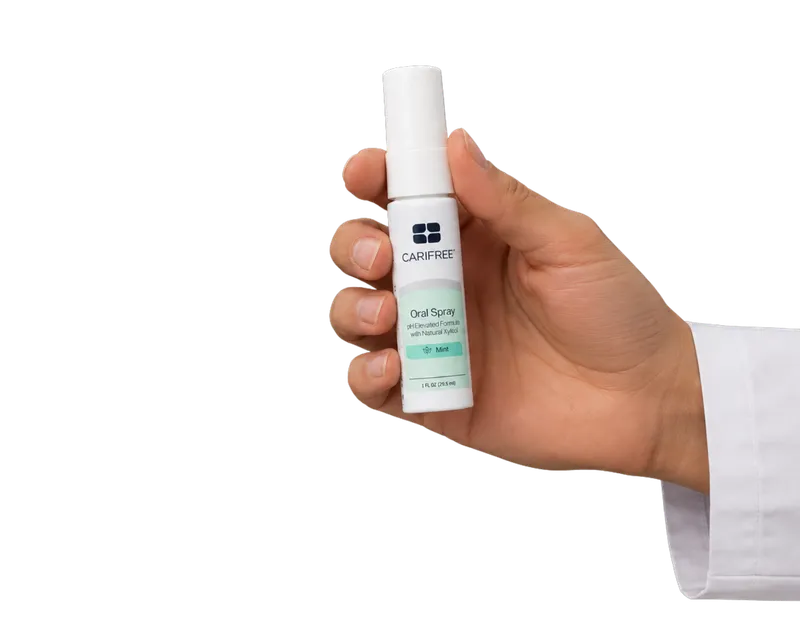 The oral spray in use