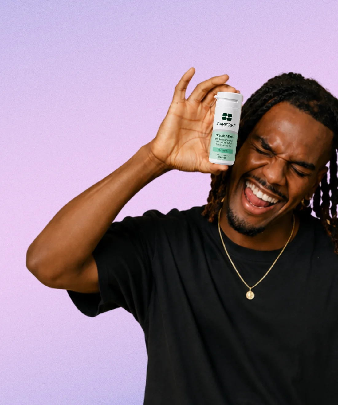 A member holding a tin of xylitol breath mints
